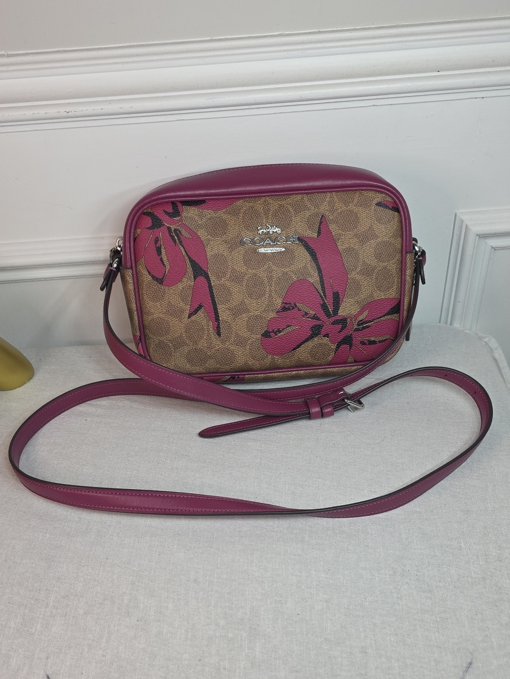 Coach Jamie Camera Bag in signature canvas, featuring a striking pink bow print